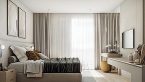 Un dormitorio moderno con cama, mesita de noche, lámpara y escritorio con espejo.