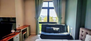 Classic Apartment, Balcony, City View | Living area - The Bok Apartment (Phu Quoc)