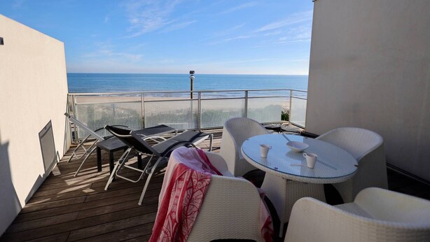 A balcony with a view of the sea, furnished with chairs and a table. - NAUTILIA  205 - Superior Luxe - Terrace - 2 people (AGDE)