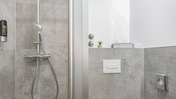 Exclusive Double Room, City View | Bathroom | Shower, free toiletries, hair dryer, slippers