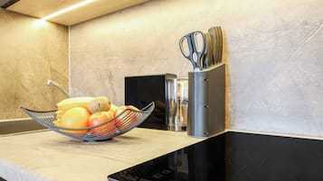 Deluxe Single Room, City View | Private kitchen | Fridge, espresso maker, coffee/tea maker, electric kettle