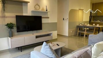 Deluxe appartement, uitzicht op de stad | Woonruimte