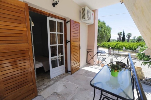 Private balcony with outdoor seating — perfect for morning coffee or an evening glass of wine.
