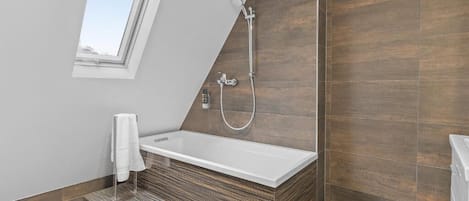 Deluxe Apartment, Valley View | Bathroom | Hair dryer, towels, soap, shampoo