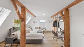Premium bedding, desk, laptop workspace, soundproofing