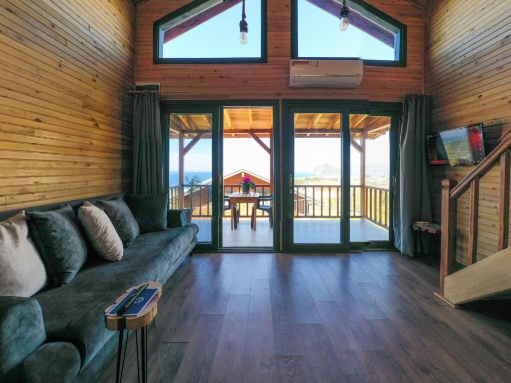 Bungalow Lune de Miel, balcon, vue mer | Coin séjour