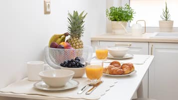 Deluxe-huoneisto, kaupunkinäköala | Ruokailu