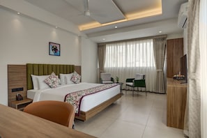 Senior Suite, Balcony, City View | In-room safe, desk, laptop workspace, blackout drapes