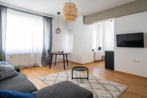 Apartamento Premium, vistas a la ciudad | Zona de estar
