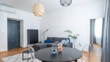 Premium-Apartment, Stadtblick | Wohnbereich