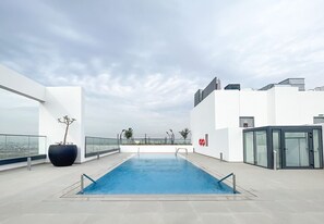 Pool - Modern 1BR Apartment in Rise Residences JVC (Dubai)