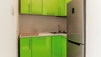 Lägenhet Superior - utsikt mot innergården | Eget kök