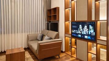 Suite – premium, byutsikt | Oppholdsområde