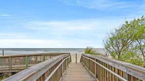 A wooden boardwalk leading to the beach with a clear view of the ocean. - Our beautiful, one bedroom beachfront condo (sleeps 6) has spectacular views of the Atlantic Ocean from the 17th floor! Newly updated in December 2025 (Myrtle Beach)