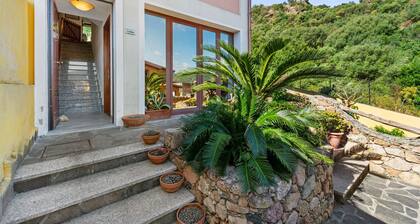 Ferienhaus „Patty“ mit privatem Garten, Balkon und Klimaanlage