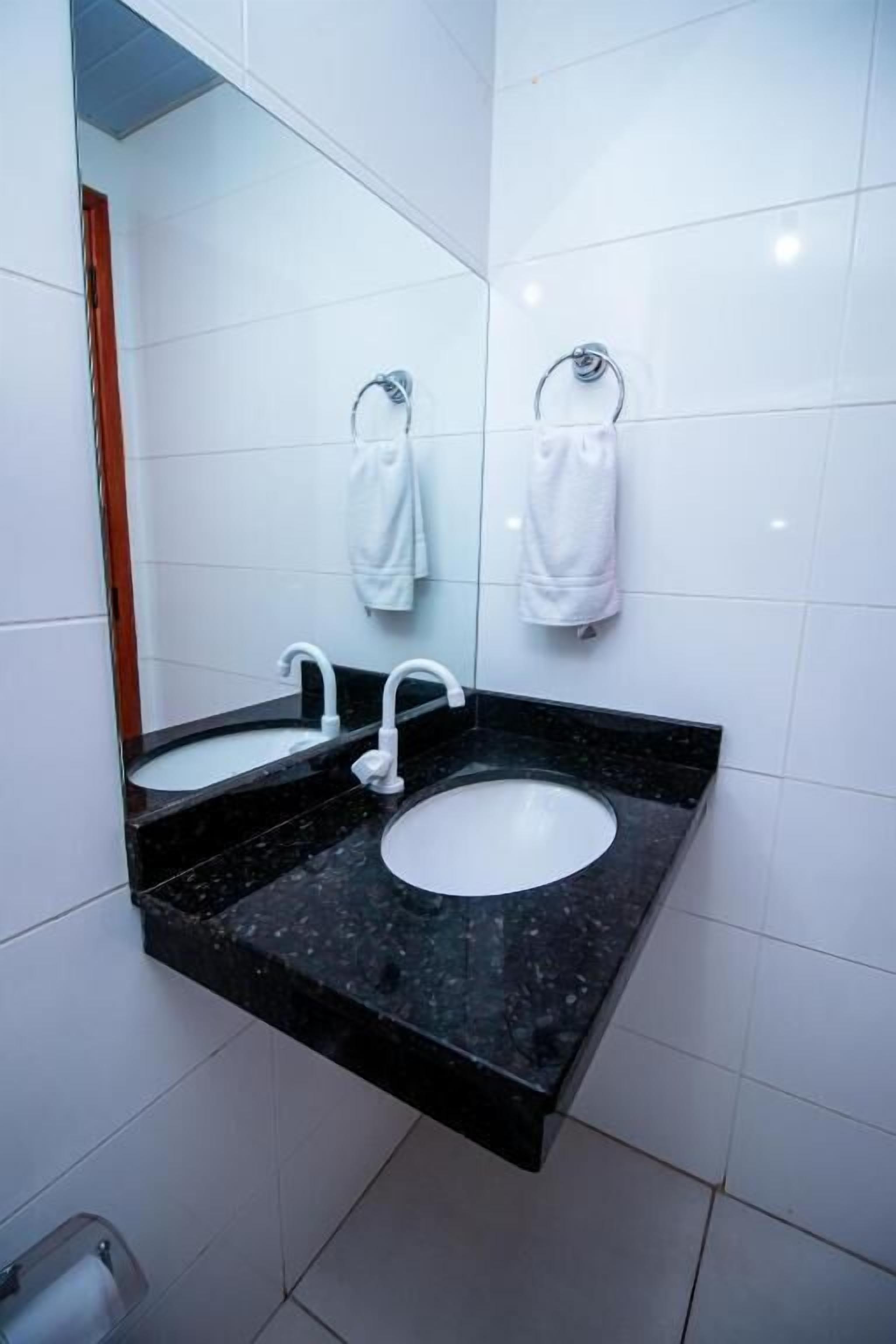 Shower, towels, soap, toilet paper