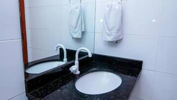 Shower, towels, soap, toilet paper