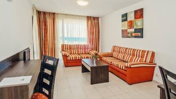 Junior Apartment, Balcony | Living area