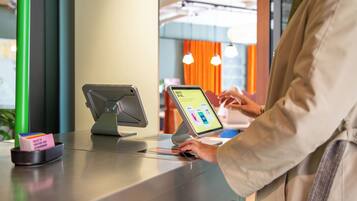 Check-in/check-out kiosk