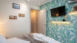 1 slaapkamer, een strijkplank/strijkijzer, wifi, beddengoed