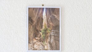 A framed picture of a canyon with a narrow passage and a tree. - Cozy Studio with Private Terrace, Air Conditioning & Pool Table – Cazaubon (Cazaubon)