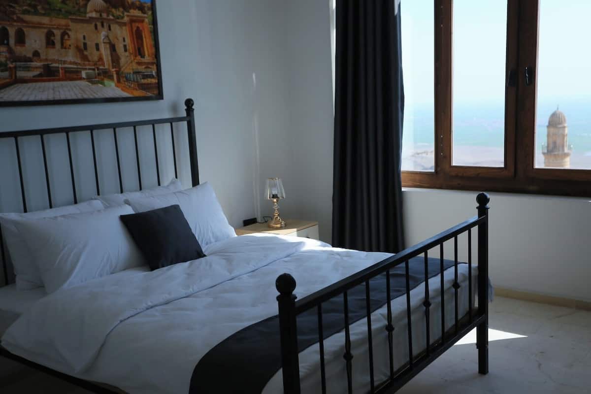 Quarto quádruplo família, vista para a cidade