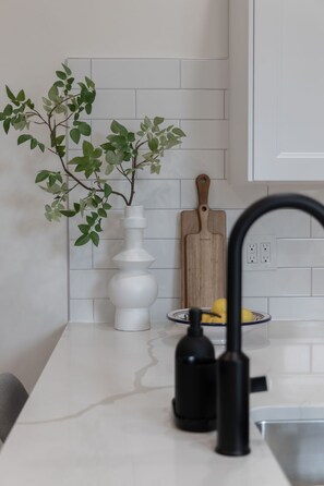 Fully stocked kitchen with complete sets of cookware. - Cozy Retreat w/2BR, Smart TV, AC, and Laundry (Toronto)