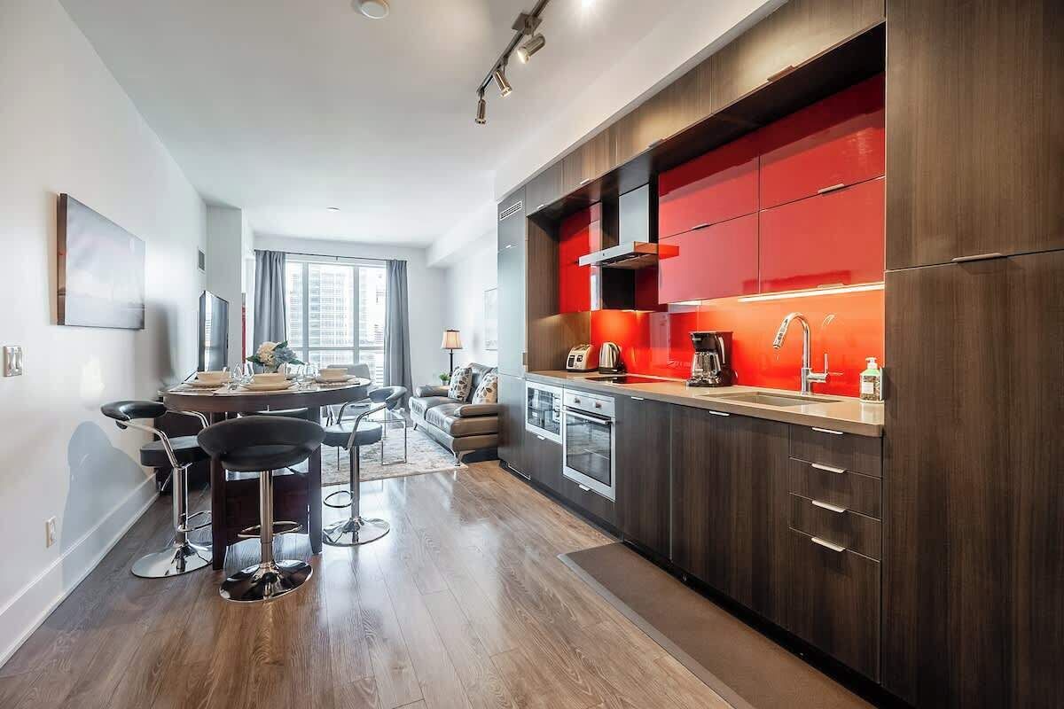 High ceilings and hardwood floors throughout this stylish condo.