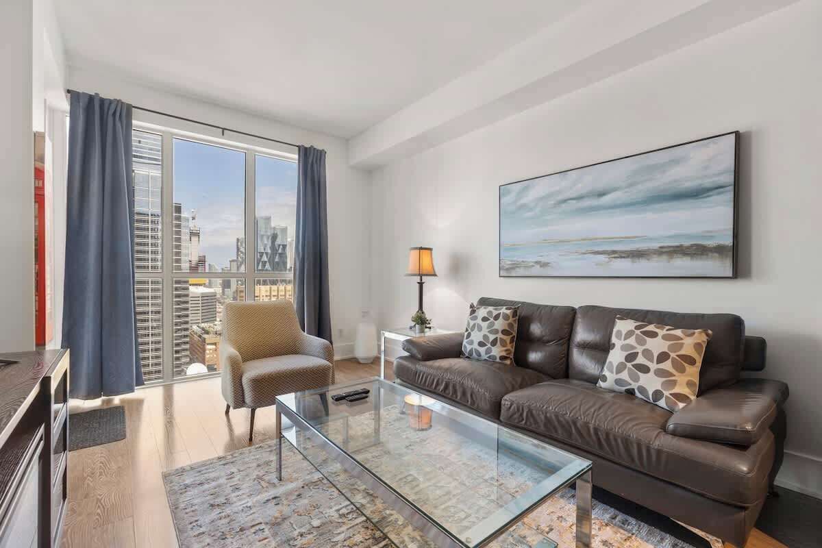 Relax on the oversized sofa in the stylish living area.
