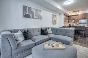 Bright and modern living space designed for comfort and relaxation. - Cozy 1BR Downtown Stay with Balcony Views (Toronto)