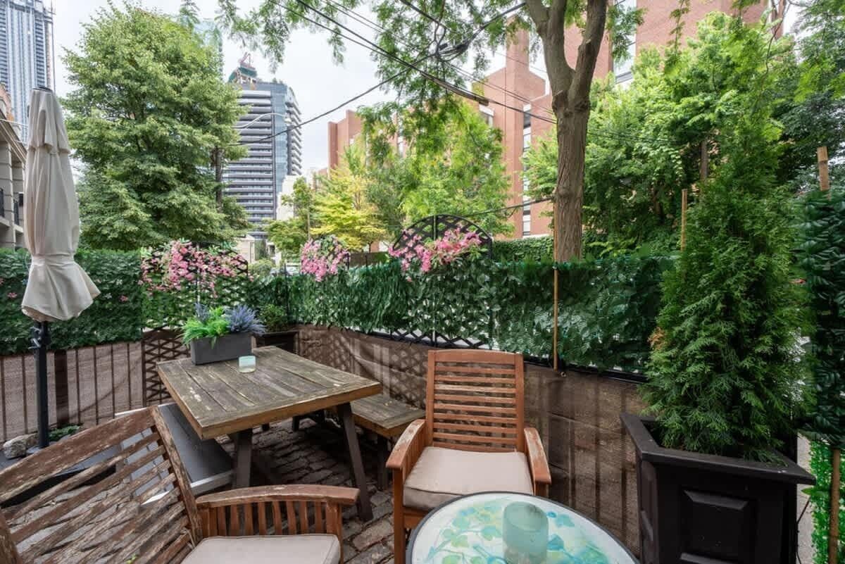 Relax in the cozy front yard, perfect for enjoying outdoor moments.