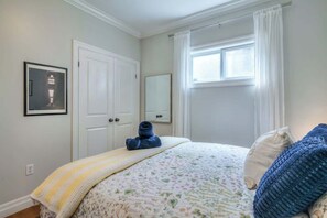Sleep in comfort with hotel-quality sheets, plush duvets, and a peaceful atmosphere in every bedroom. - Cozy 3BR Home | 2Kitchens + Backyard | Leslieville (Toronto)