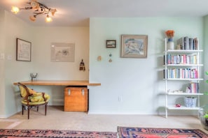 Relax and unwind in the bright, comfy, and spacious living room, perfect for lounging after a day out in the city. - Cozy 2BR Home w/ Workspaces & Parking (Toronto)