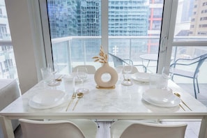 Compact and cozy dining space for meals or takeouts. - 1BR+Den Downtown CN Tower View Condo (Toronto)