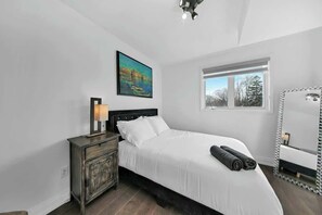 Sleep in comfort with hotel-quality sheets, duvets & stylish decor. - Hidden 3BR Gem w/ Workspace, Fast wifi & Parking! (Toronto)
