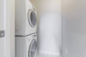 In-suite washer and dryer for added convenience during your stay - Modern Downtown Toronto Condo near CN Tower (Toronto)