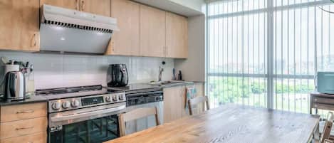 Cook with ease in the fully equipped kitchen—complete with modern appliances and cookware.