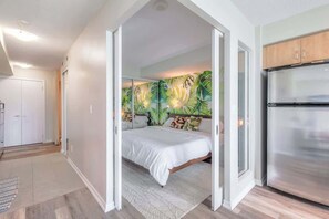 Sleep soundly in a plush bed with hotel-quality linens and fluffy duvets. - Chic 1BR+Den Condo | Fast WiFi & Free Parking (Toronto)