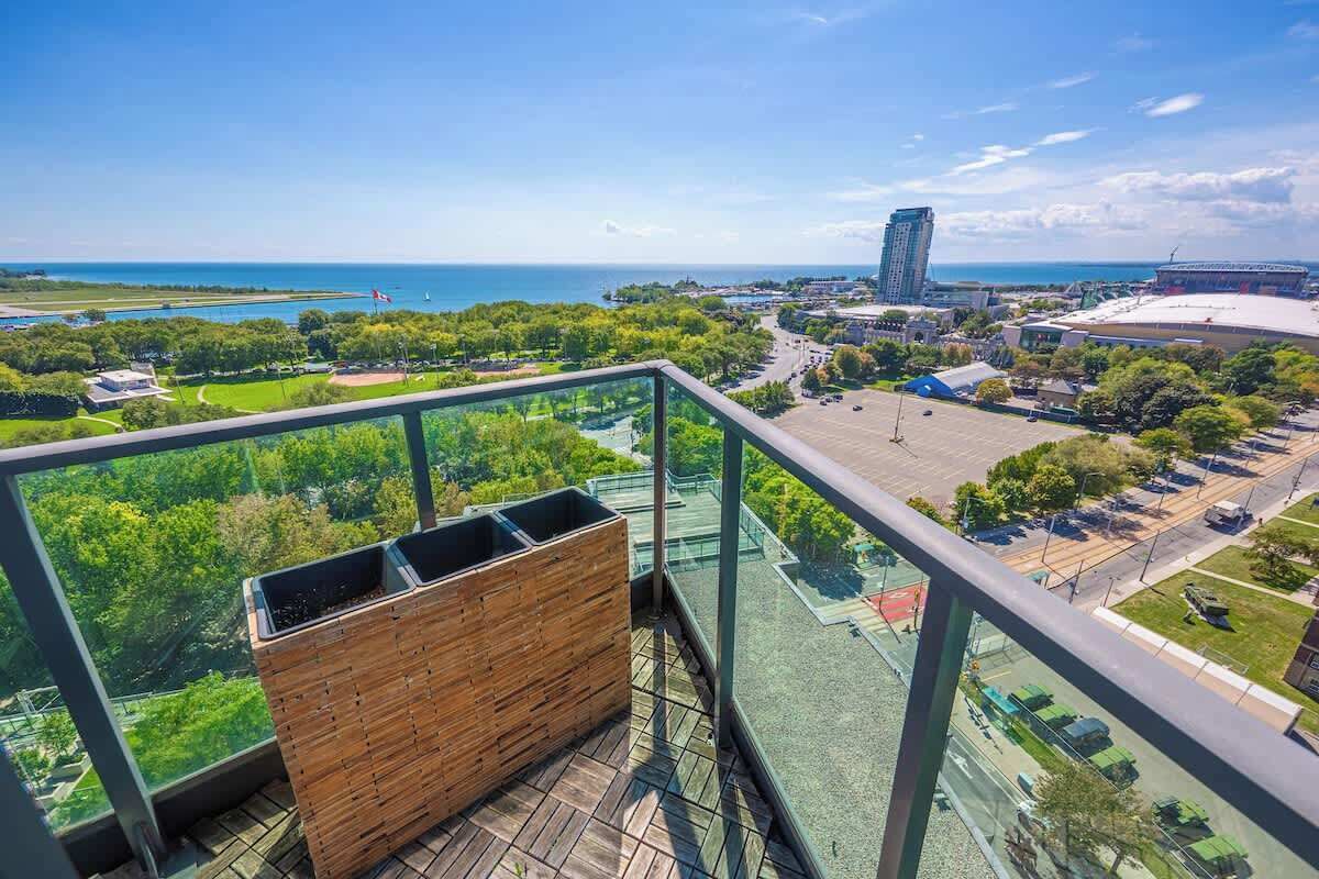Private balcony with breathtaking views of the lake and city skyline.