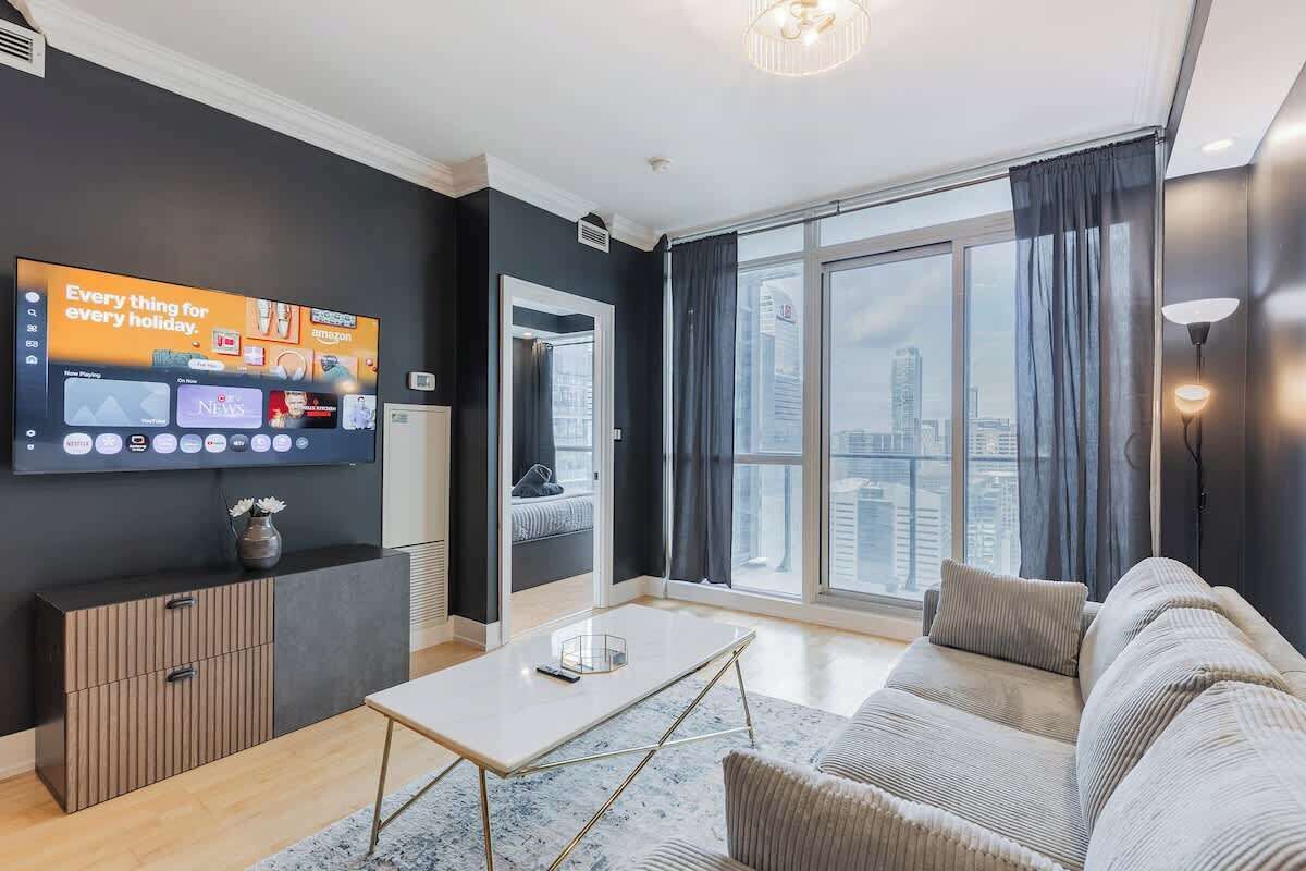 Bright and cozy space with a Smart TV and comfy seating to relax after exploring the city.