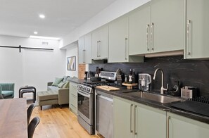 Cook like a pro in this fully equipped kitchen, complete with modern appliances and essentials.