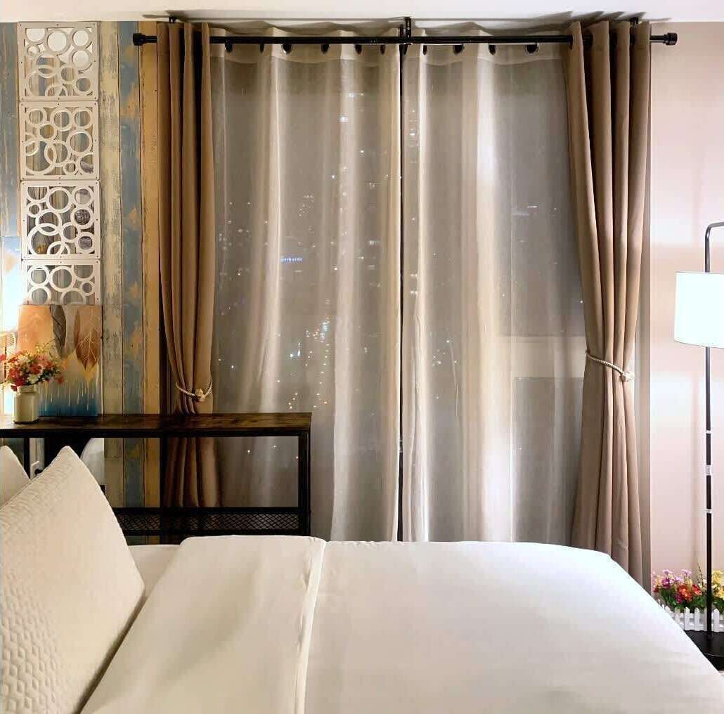 Comfortable queen bed with fresh linens
