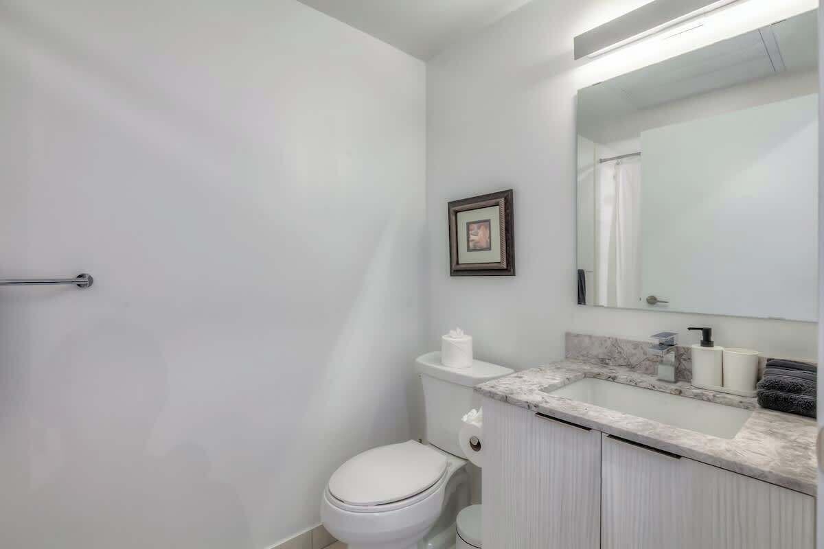 Fresh, sanitized bathroom stocked with towels, toiletries, and all the essentials.