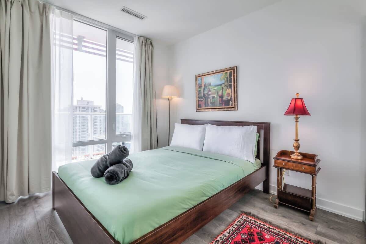 Sleep soundly in a plush Queen bed with crisp hotel-style linens and fluffy duvets.
