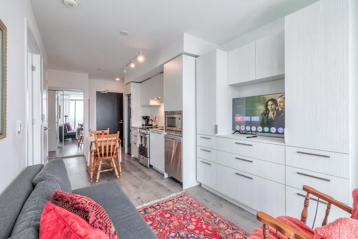 Relax and unwind in the cozy living space, complete with a smart TV and comfy seating.