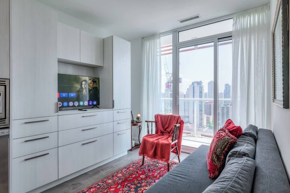 Relax and unwind in the cozy living space, complete with a smart TV and comfy seating.