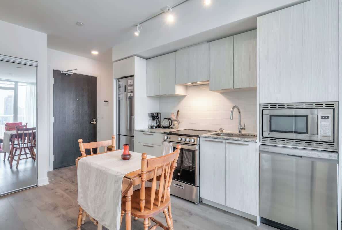 Compact dining nook perfect for meals, work, or planning your city adventures.