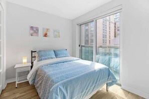 Extra space for work or sleep, the den features a comfy full bed to suit your needs. - Downtown 3BR Condo w/Parking, Walk to Hotspots (Toronto)