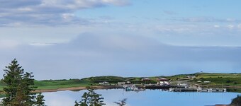 Private, serene ocean view on 3 acres. Room for ten.