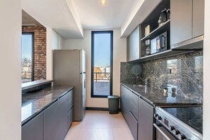 Fridge, microwave, oven, stovetop - Soho Village en Palermo by Magno | 802 (Buenos Aires)